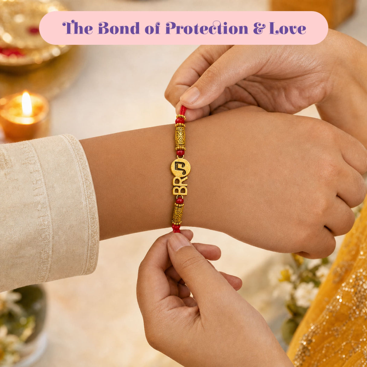Gold-colored rakhi bracelet with red beads and engraved br charm in 2pc designer rakhi set for brother and sister-in-law