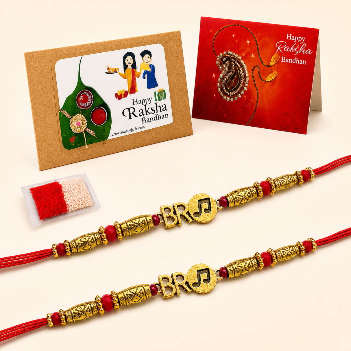 Gold-colored rakhi with red thread and decorative beads from 2pc designer rakhi bracelet gift set for brother and sister-in-law
