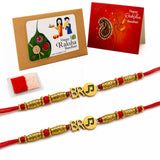 Gold-colored rakhi with red thread and intricate beadwork in 2pc designer rakhi bracelet gift set for brother and sister-in-law