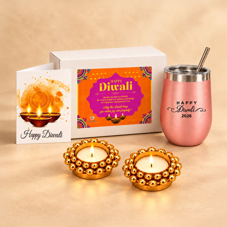 Rose gold metallic stainless steel tumbler with black engraved happy diwali 2026 text and stainless steel straw