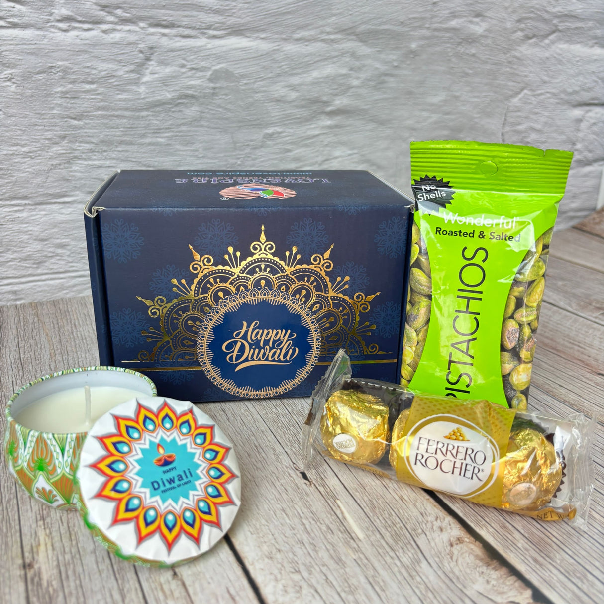 Premium Diwali Gift Hamper Box with decorated box candle pistachios chocolates and Happy Diwali stickers