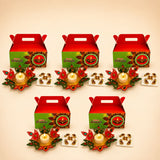 Diwali gift hamper featuring red and green happy diwali themed gable boxes with acrylic rangoli set and floral candle holders