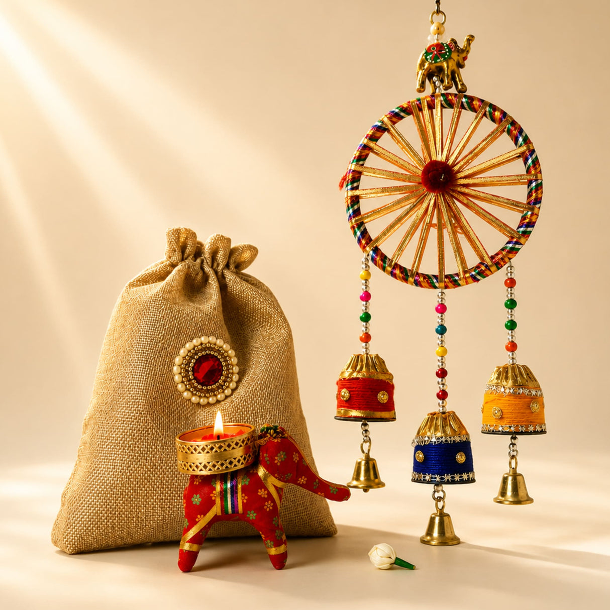 A vibrant handcrafted jute potli bag with colorful braided spokes and hanging bells for Diwali and festival gifts