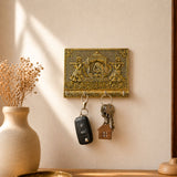Decorative Indian doli hand crafted golden key holder with embossed figures and archway mounted on wall with four hooks