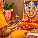 Mandeville chocolate bar in gold foil wrapper with Durga Chalisa book