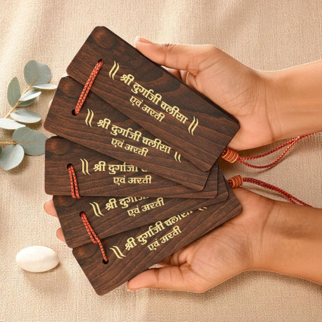 Dark wooden prayer beads with gold Durga script on red string