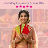 Woman in peach gold outfit holds assorted Shagun envelopes with Doli elephant design