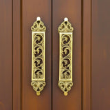 Pair of ornate antique gold brass door pulls with scrollwork 11.7 inches