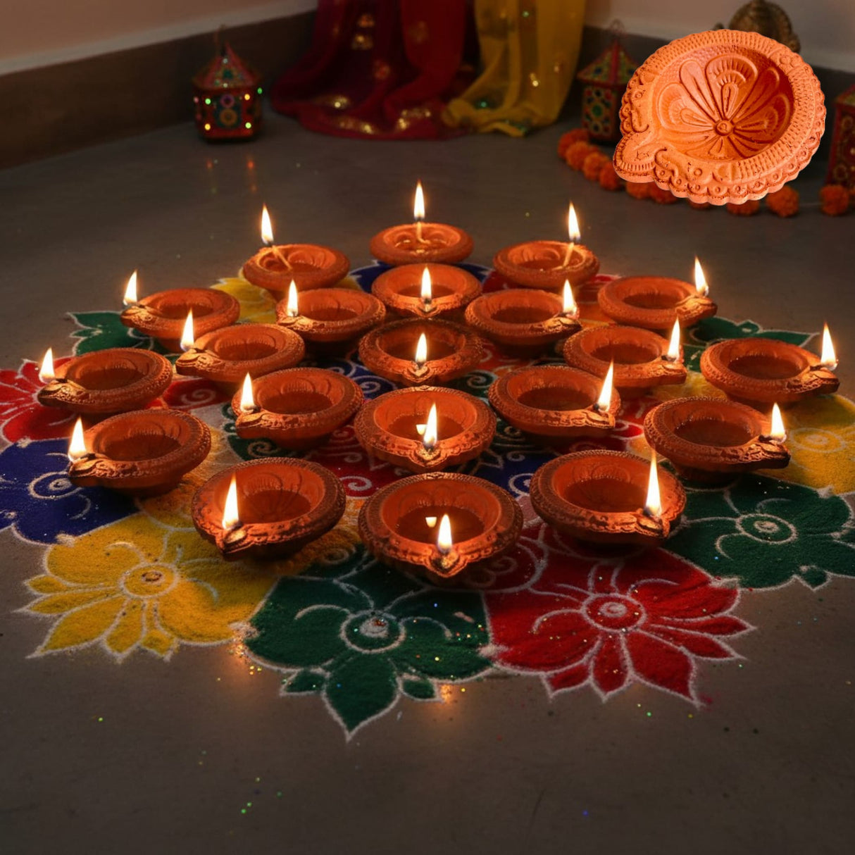 Traditional handmade terracotta diya set with carved designs and flames for Diwali