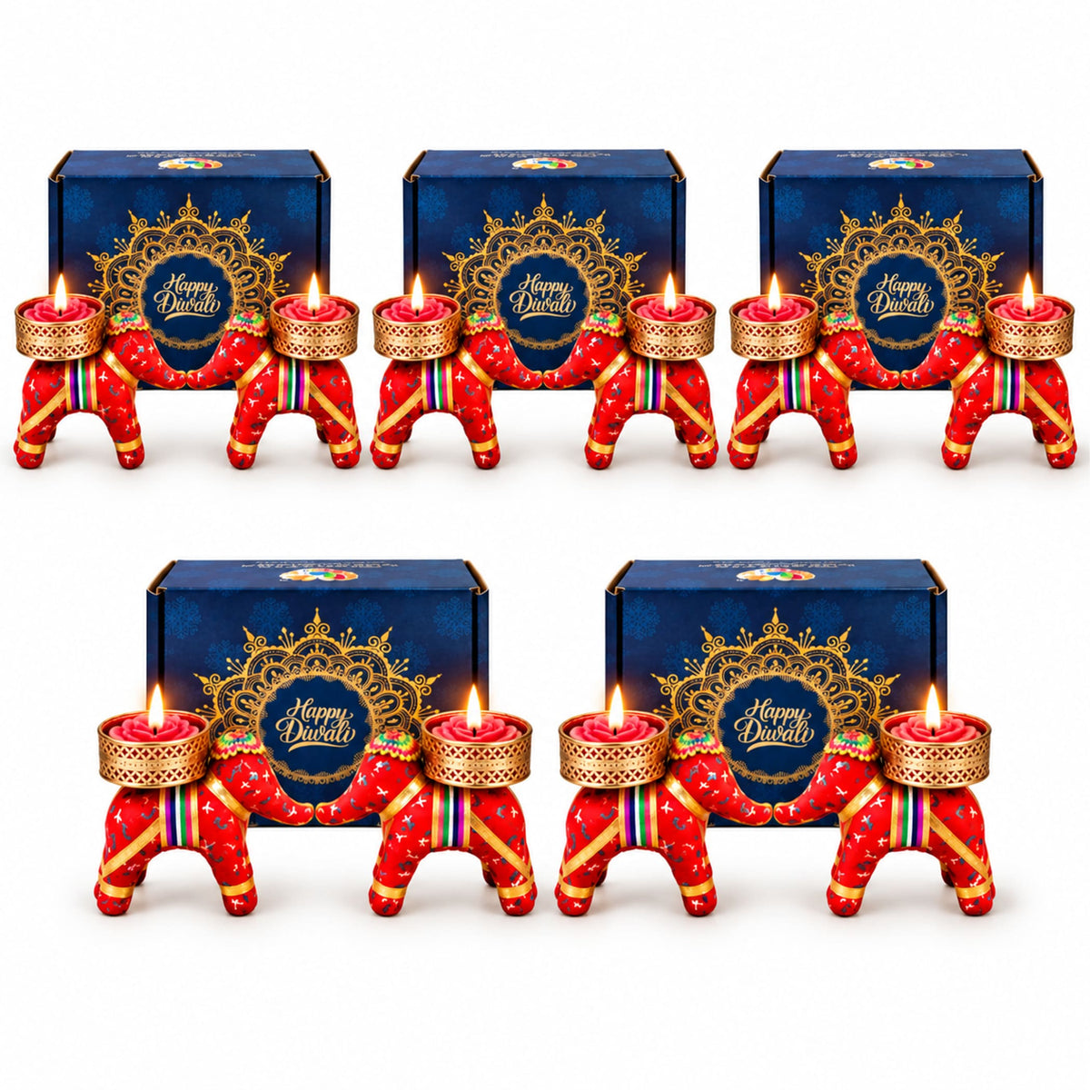 Red elephant-shaped diwali candle holders with gold accents and decorative patterns for festive gift hampers