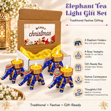 Blue elephant-shaped tea light holders with gold detailing and colorful patterns in a festive gift box for Diwali and occasions