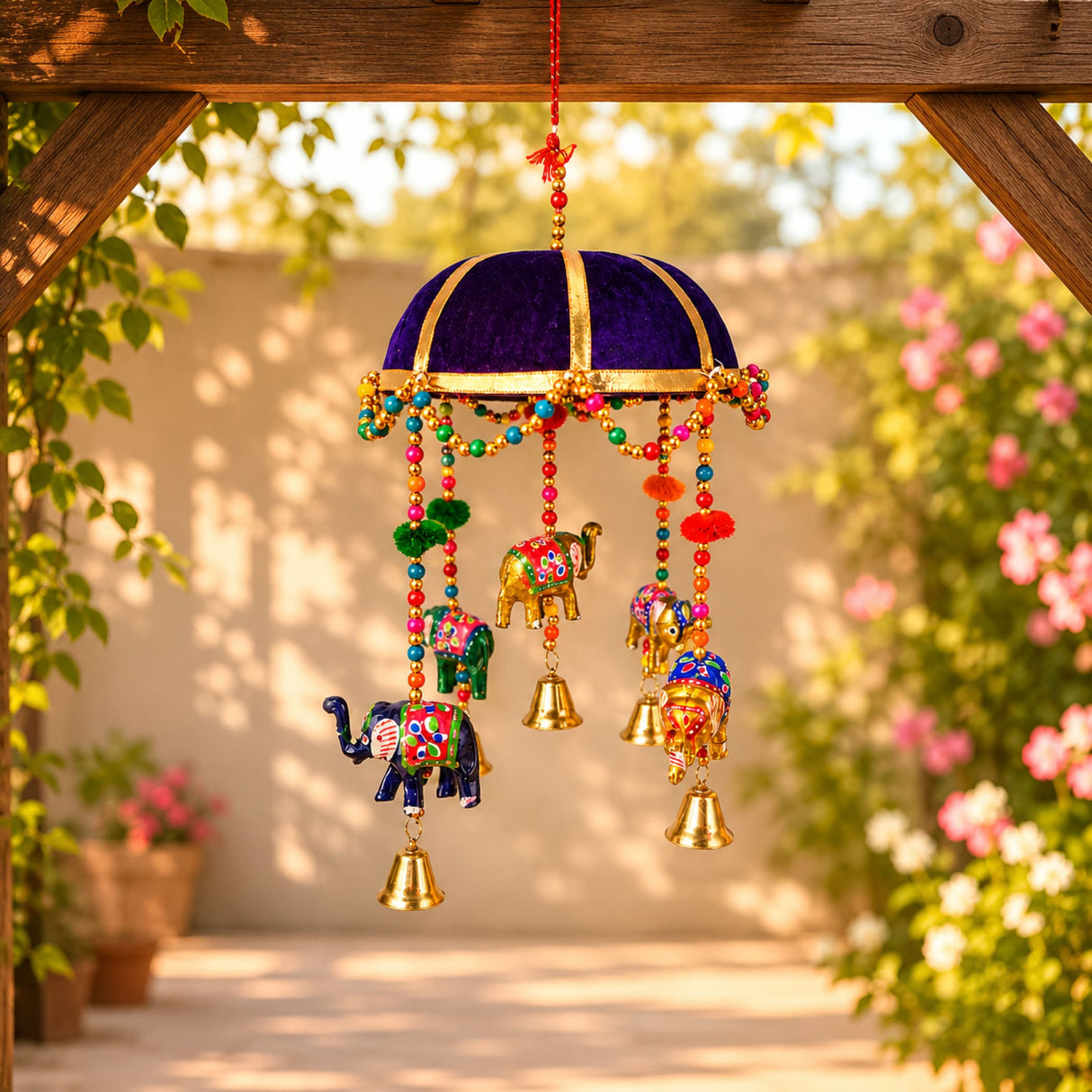 Elephant door hanging with vibrant purple gold dome, colorful beaded chains, miniature elephants, and golden bells for decor