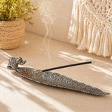 Silver elephant-shaped filigree incense holder with red gemstone holding burning stick for mess free goodluck gift