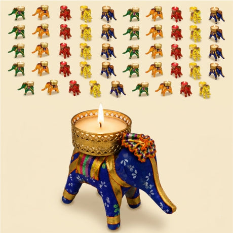 Blue elephant-shaped tealight holder with gold accents and colorful embroidery, featuring a woven metal rim for Diwali decor