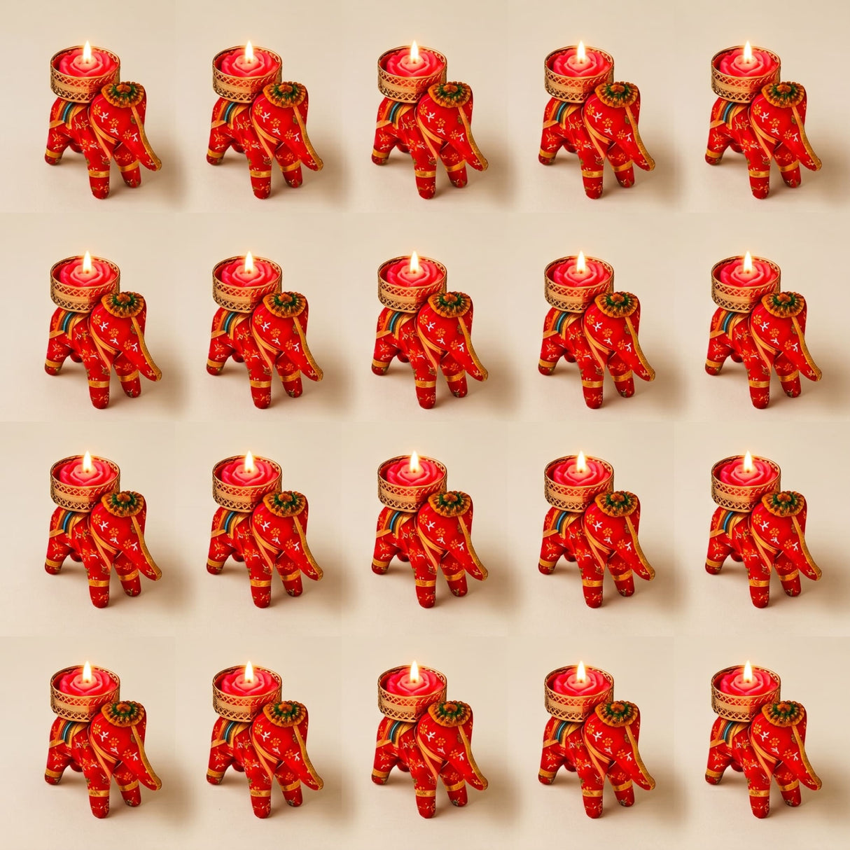 Red elephant-shaped tea light candle holders with gold and green embroidered details for festive home decor
