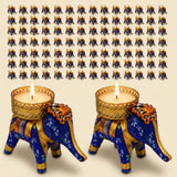 Blue elephant-shaped tea light candle holders with gold accents and intricate patterns for festive home decor