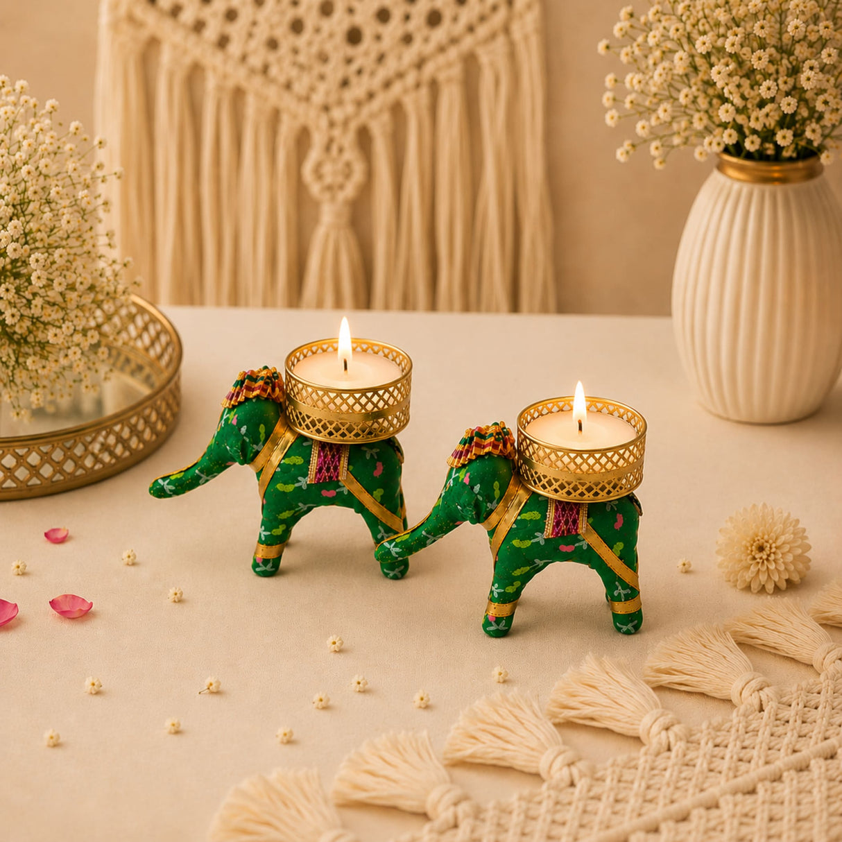 Green elephant-shaped tea light candle holders with gold accents and intricate patterns for festive home decor