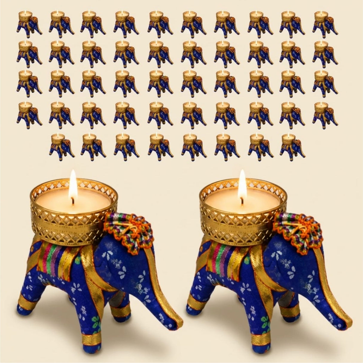Blue and gold elephant tea light candle holders with intricate patterns and decorative fabric accents for festive decor