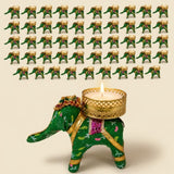 Green elephant-shaped tea light candle holder with gold accents and intricate embroidery for diwali decor