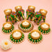 Elephant tealight rangoli candle holders in green and gold with intricate embroidery and pearl accents for festive decor