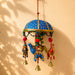 Elephant umbrella door hanging with vibrant blue and gold embroidery featuring decorative elephants beads and bells