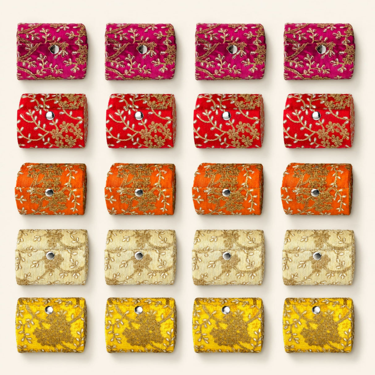 Vibrant embroidered velvet bangle organizing pouches in pink red orange cream and yellow with gold thread detailing