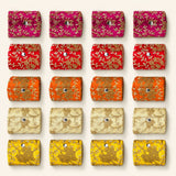 Vibrant embroidered velvet bangle organizing pouches in pink red orange cream and yellow with gold thread detailing
