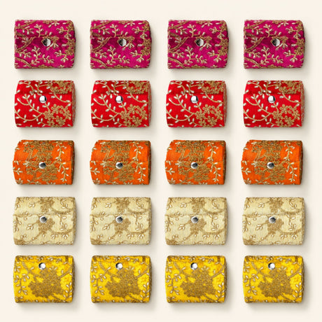 Vibrant embroidered velvet bangle organizing pouches in pink red orange cream and yellow with gold thread detailing