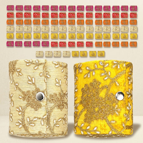 Two embroidered clutch bags in cream and vibrant yellow featured as bangle organizing boxes for jewelry storage