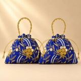 Designer potli bag in royal blue with gold thread embroidered floral patterns and beaded handles for weddings and gifts
