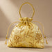 Designer potli bag yellow satin with gold embroidery pearl accents and beaded handle for weddings and jewelry gifts