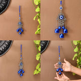 Blue evil eye hamsa hand charm with bells, beads, silver design, 9 inch
