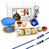 Blue and white beaded rakhi with blue evil eye charms from raksha bandhan gift hamper set for bhaiya bhabhi