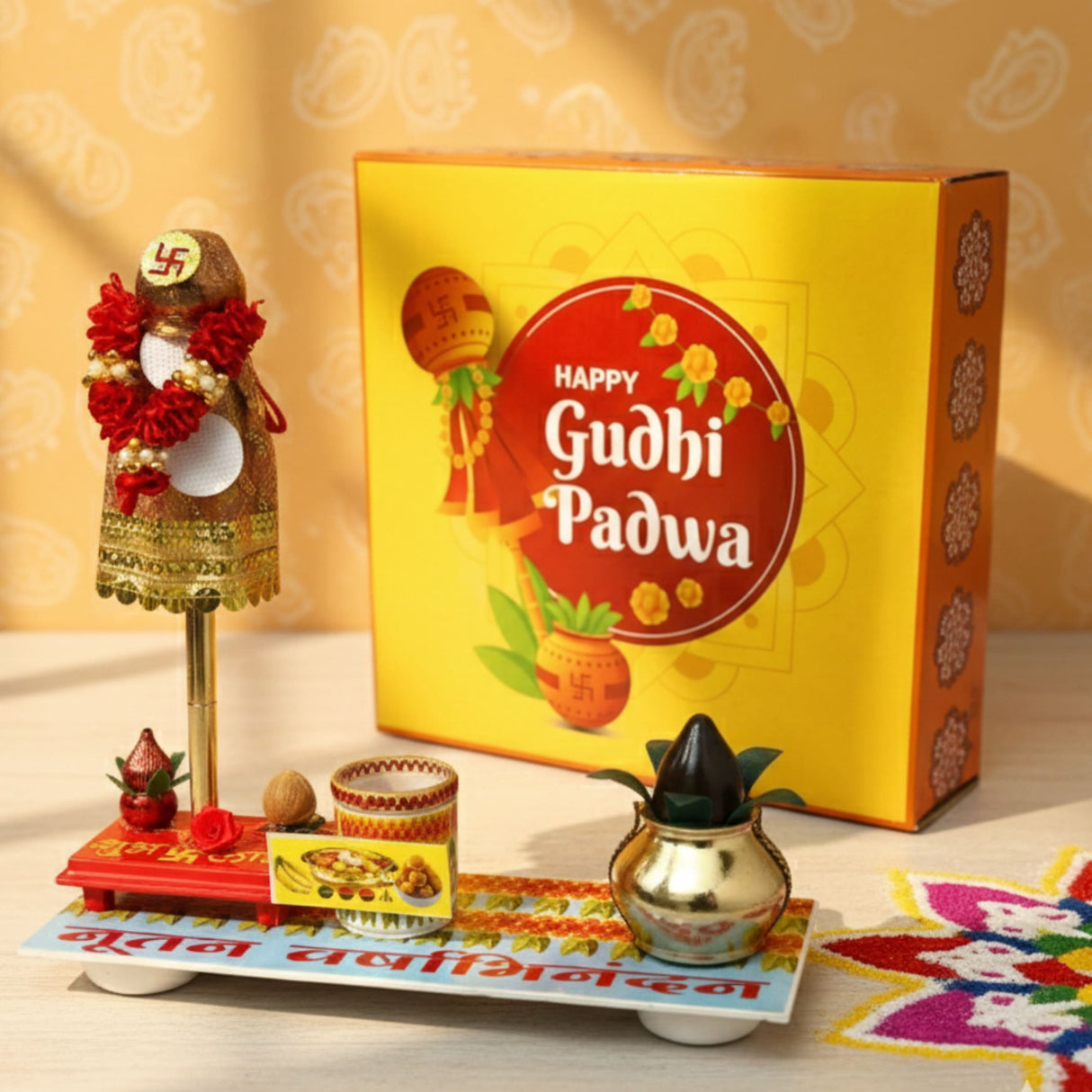 Golden Gudi showpiece with red flowers, gold embellishments, plastic gathi mala and kalash on slender stand