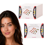 A woman wearing a red and gold decorative crystal kumkum bindi for Indian wedding and ceremonial favors