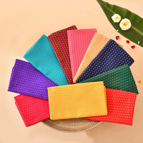 A vibrant fan of colorful patterned unstitched floral blouse pieces for women saree pooja housewarming gifts