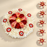 Decorative floral rangoli mat tealight candle holder with a golden diya and white pink rose accents for home décor