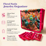 Floral print satin jewelry box with pink trim and four transparent zip lock pouches for travel and gifting