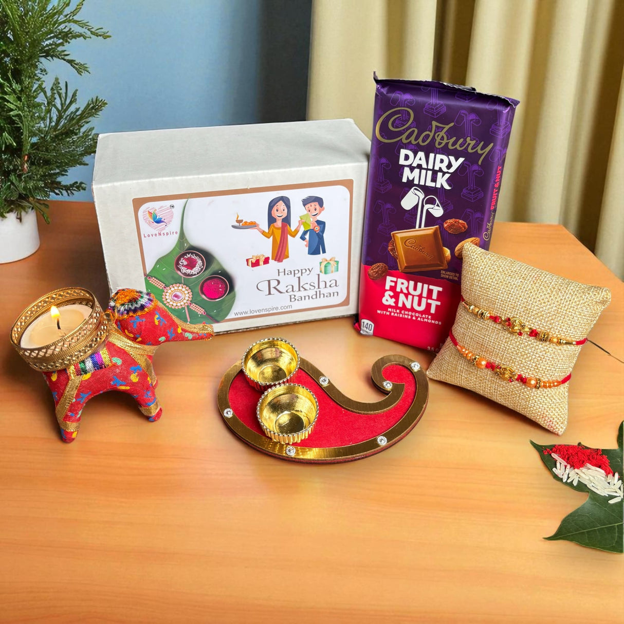 Rakhi Gift Hamper for Brother Bhabhi Raksha Bandhan Set of 2 Ganesha Bracelet Rakhis with Roli Chawal Rakhi Stickers Gift Box Bhaiya Sister In Law Traditional Rakhi Combo - LoveNspire