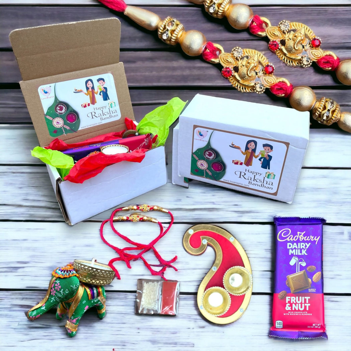 Rakhi Gift Hamper for Brother Bhabhi Raksha Bandhan Set of 2 Ganesha Bracelet Rakhis with Roli Chawal Rakhi Stickers Gift Box Bhaiya Sister In Law Traditional Rakhi Combo - LoveNspire