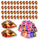 Red and gold ornate ganesha-shaped oil lamps with intricate detailing used as decorative kumkum holders for pooja thali