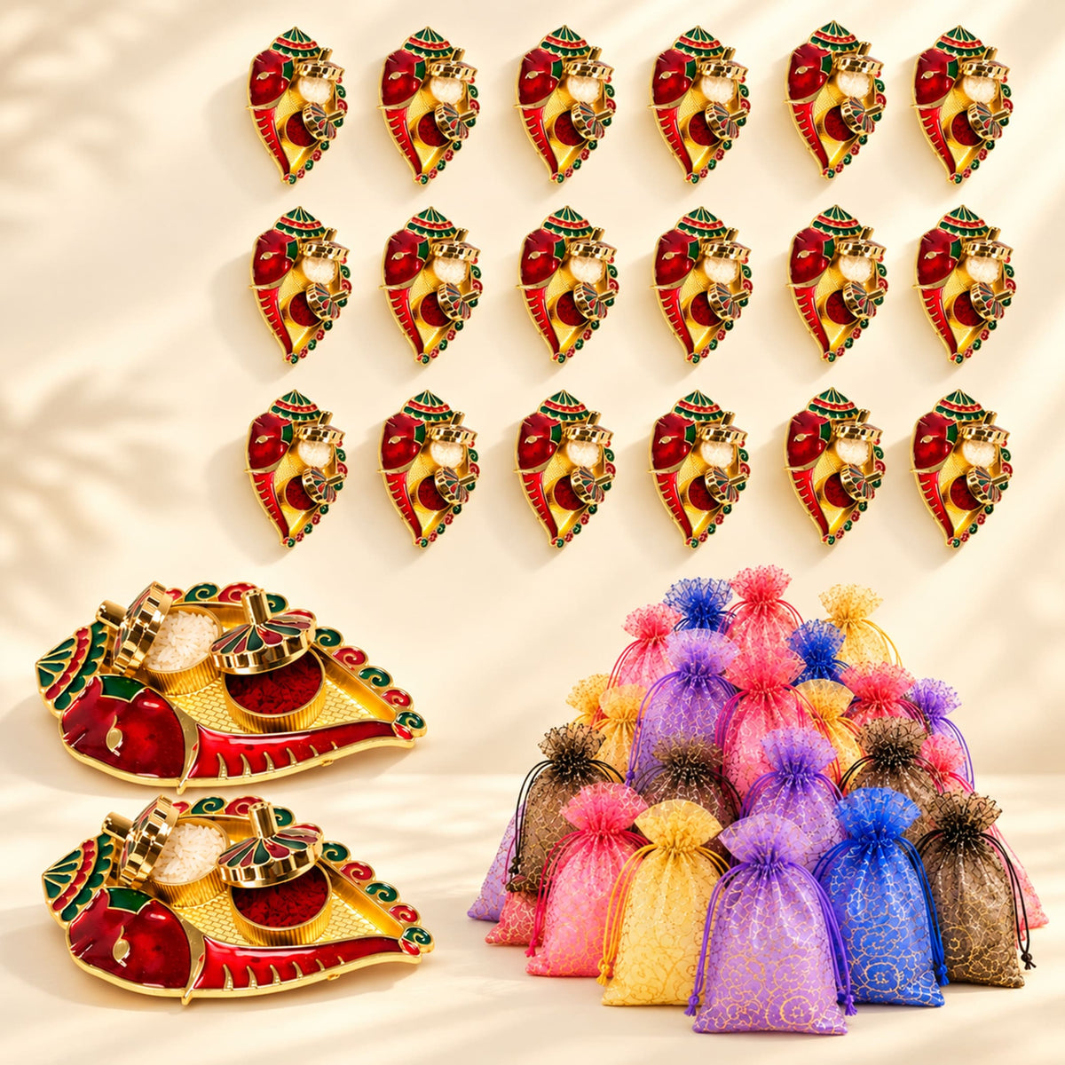 Decorative ganesh shankh haldi kumkum diya holders in red and gold with green accents for pooja thali and gifts