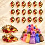 Decorative ganesh shankh haldi kumkum diya holders in red and gold with green accents for pooja thali and gifts