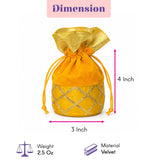 A vibrant yellow velvet drawstring pouch with gold lattice pattern for Ganesha gift hamper and Hindu religious occasions
