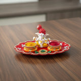 Red and gold Ganesha Haldi Kumkum Holder Thali with elephant figurine and decorative elements
