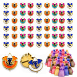 Colorful enamel elephant-shaped decorative Ganesha haldi kumkum holder pins with gold-tone frames and tassels for pooja thali
