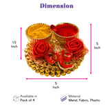 Gold-colored decorative haldi kumkum thali holder with bowls, red fabric roses, and small elephant figurine for pooja gifts
