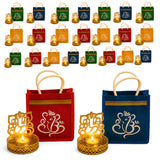 Ganesha gift hamper with red and blue jute bags featuring gold trim and rope handles paired with golden candle holders