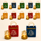 Colorful velvet ganesha gift bags with gold trim and embroidered motifs paired with ornate golden candle holders for religious gifts