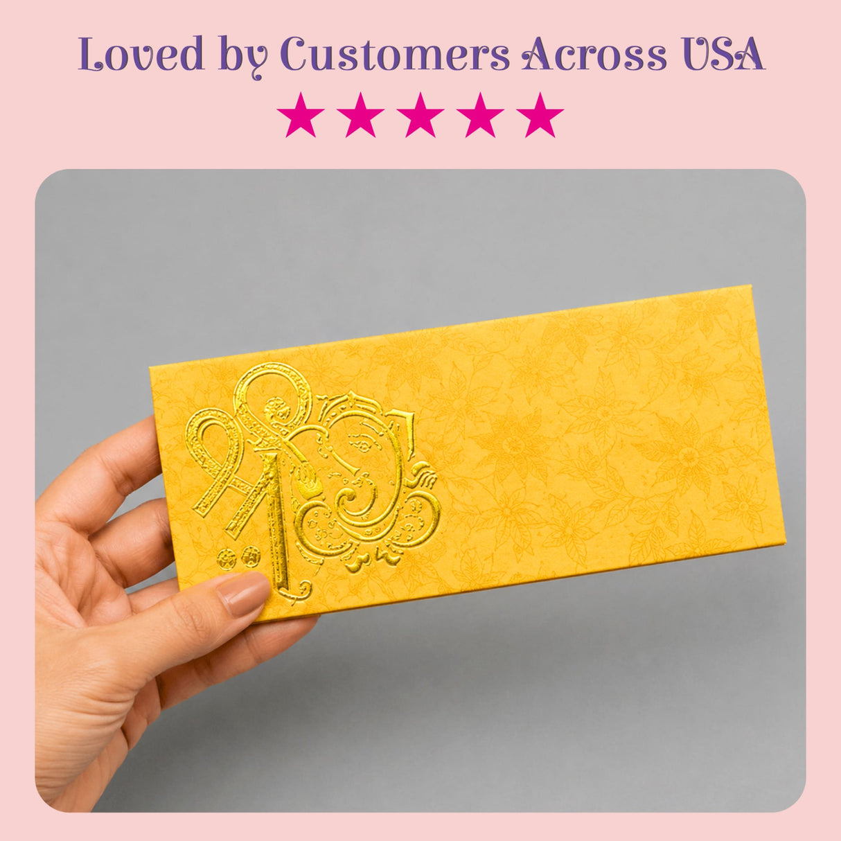A golden-yellow textured money envelope with embossed ornate design featuring stylized letter r for Indian weddings